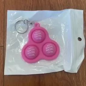 Anti Social Social Club “Still Stressed” Keychain Pink