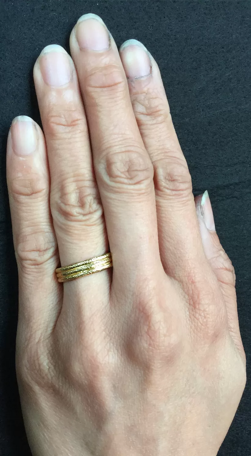 Delicate Triple Band in 18k Gold