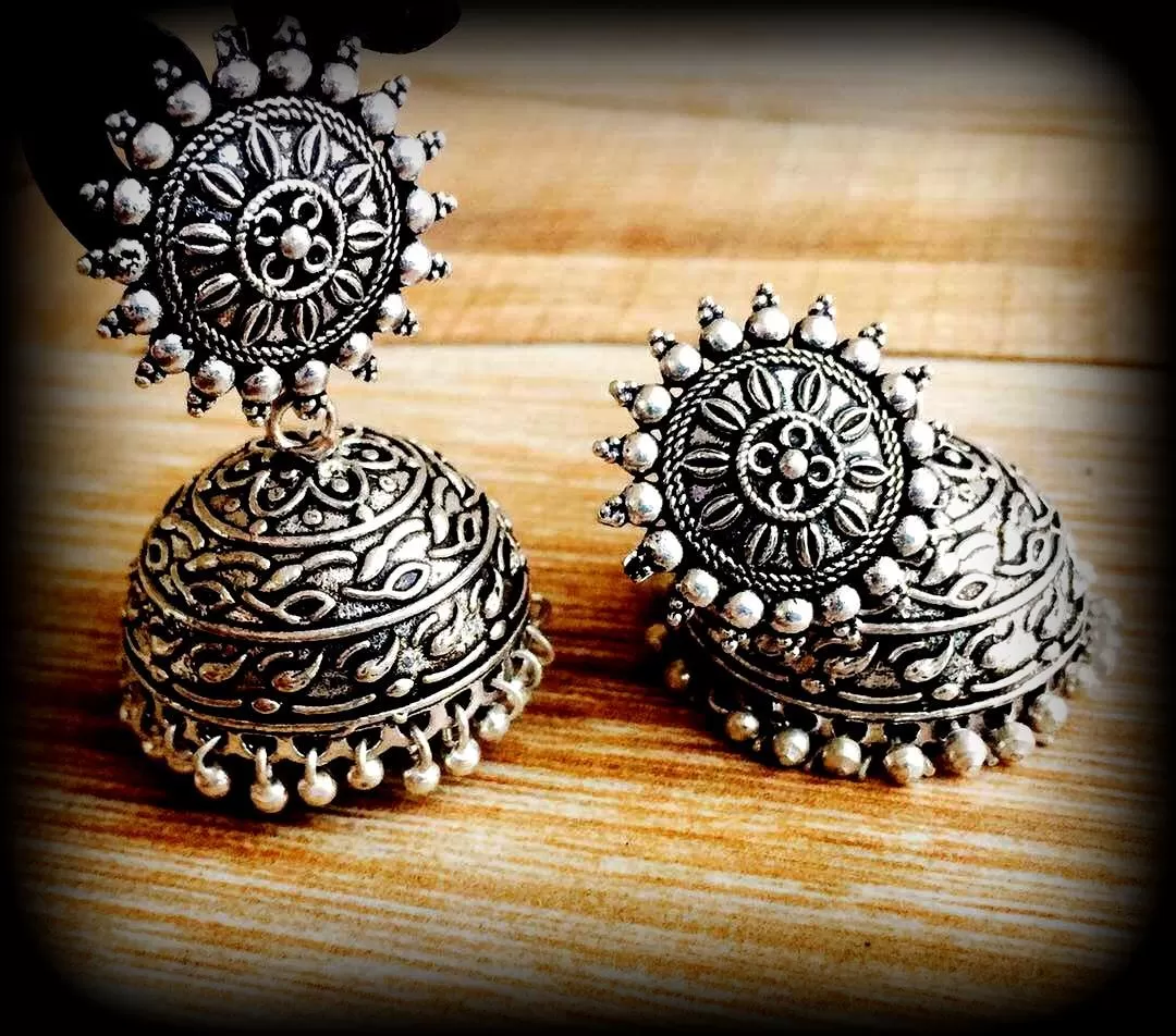 Suryakanthi German Silver Jhumkas